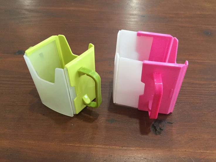 Adjustable popper holders (juice box)