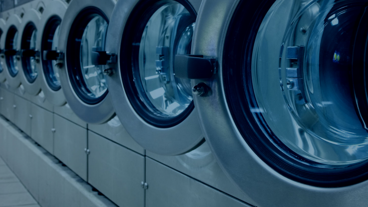 How do commercial laundries operate?