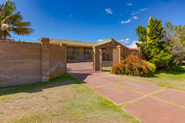 SECURE FAMILY HOME WITH GATED ENTRANCE A